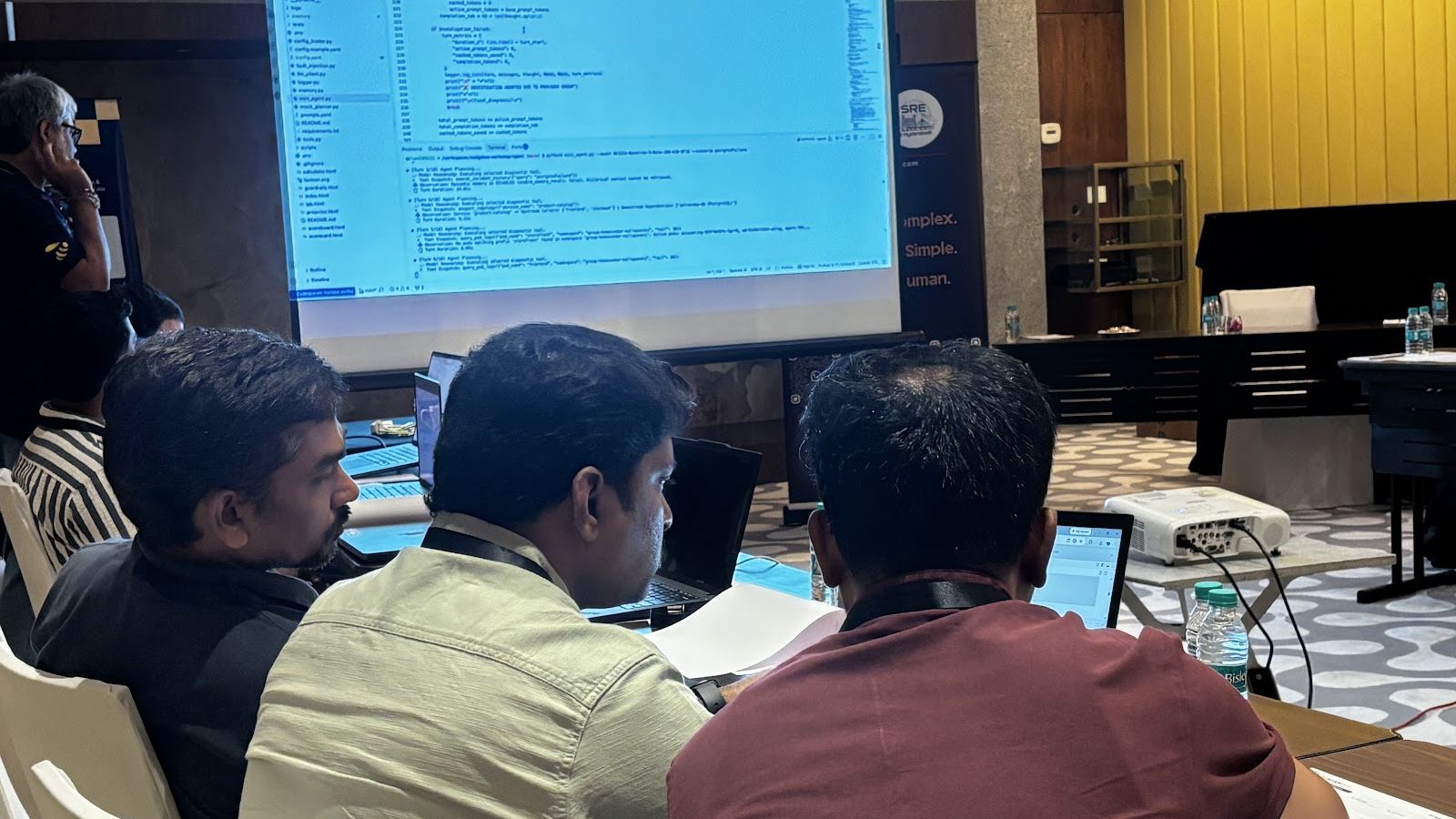 Attendees running the lab while a host walks through the steps on screen